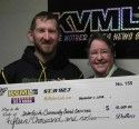 Lloyd Mathiesen and Cathie Peacock with check from Chicken Ranch Casino