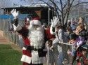 Santa Claus greets children at the Santa Fly-In