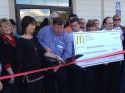 Owner Dennis Grasspointner cutting ribbon at New McDonalds Restaurant