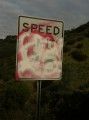 Speed signs vandalized on the Old Priest Grade