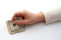 Finance - hand holding bils