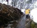 A T.U.D. Worker Clears A Water Ditch In Twain Harte