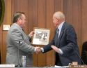 Supervisor John Grey Presents a Photo of Tuolumne Road to Supervsor Dick Pland