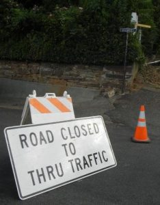 Road closed to thru traffic sign