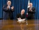 Governor Jerry Brown Signs The Budget Surrounded By Speaker John Perez And Senate Pro Tem Darrell Steinberg