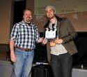 Director Ari Costa receives