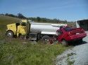 A Ford Escort Collided With A Gravel Truck At The Montezuma Junction