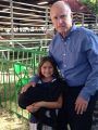 Governor Brown with Katie Morelos and her baby goat at the Mother Lode Fair