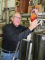 Indigeny's Jay Watson with Apple Brandy bottle
