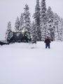 Snowcat grooming the mountain