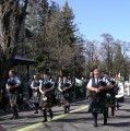 Led by the White Hackle Pipe Band, the Murphys Irish Day Parade makes its way down Main St.