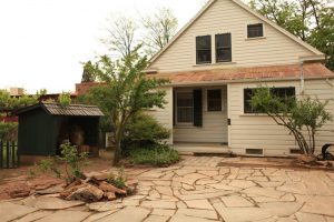 Mrs. McConnell let Gary Cooper and Grace Kelly use this patio during their breaks filming High Noon. They would find shade under a fig tree back there that was since cut down, and now it's growing back. The new fig tree was a wonderful surprise.