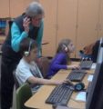 Fast ForWord teacher with students