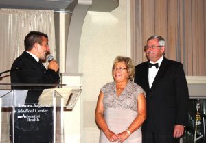 Andrew Jahn presents Irving J. Symons Award To Suzy and Bill McEntire
