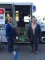 Left: Jeannie Hayward, Right: Bonnie Acosta, staff member, at the “Stuff the Bus” event