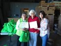 Mother Lode Food Project Founders Ellen Beck and Sue Mundy with A-TCAA Food Bank director Lee Kimball