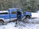 Stolen truck stuck on dirt road in Groveland