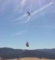 Helicopter spreading wood shreds