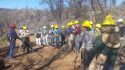 Rim Fire replanting volunteer planting lead Kim Williams instructs volunteers.