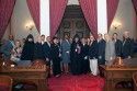 Commemorating the passage of AJR 34 at the state capitol with State Senatore Tom Berryhill in tan paints