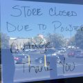 Note to customer on doors of store