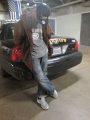 Andrew John Labriola next to patrol car