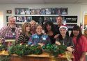 Cathie Peacock, surrounded by Big Joe Marshall, Bridgette Fannuchi, Sally Van Bolt, Maryann Curmi, Mark Grauer, Sabrina Biehl and DJ Riendeau