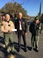 Sgt. Ed Evans Receives A Check From Steve Neiner