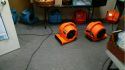 Fans being used to dry out the flooded store