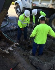 T.U.D. officials repairing waterline