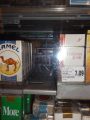 locked cigarette cabinet that was broken into at store