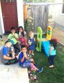 The Parrots Ferry Village kids take a popsicle break.