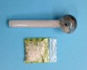 Drugs and pipe foud in search