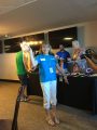 TCVB Marketing Special Projects Coordinator Anna Davies is holding the ribbons