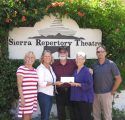 Board members Tracy Russell, Carey Haughy and Dana Mayo of Sonora Area Foundation flank retiring Sierra Repertory Theatre directors Dennis and Sara Jones as they receive the 2017 Irving J. Symons Community Impact Award