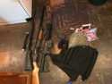 Guns found at drug raid site
