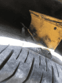 Highway reflector stuck in Kathleen Boone's flat tire, Sept 7 2017