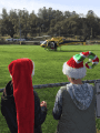 2017 Santa-Fly-in and Interfaith Coat Drive helpers watch St. Nick arrive