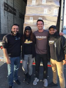 Amazon team visits ATCAA warehouse in Jamestown to offload surprise $76,000 in donated goods from the online giant, Dec. 1, 2017