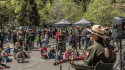 Park Ranger Kate performs music on the Earth Day Stage.