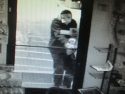 Burglar breaking into Cold Springs Market