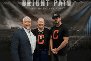 Tuolumne Band of We Wuk Indians Tribal Chief Kevin Day with Jim Thorpe's son Bill Thorpe and actor Martin Sensmeir in front of Bright Path The Jim Thorpe Story background