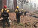 Donnell Fire engine crew extinguishing hot spots