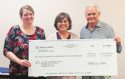 C’Anne Johnson, M.S. licensed marriage and family therapist for Catholic Charities, Elvira Ramirez, ED Catholic Charities, and and Larry Philipp, Interim MTMC President and CEO