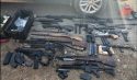 Huge Gun Stash Results In One Arrested, Another A Fugitive