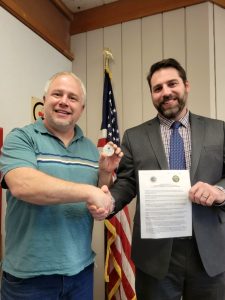 Tuolumne Supervisor Chair Ryan Campbell presented Sonora Mayor Matt Hawkins with a challenge coin.