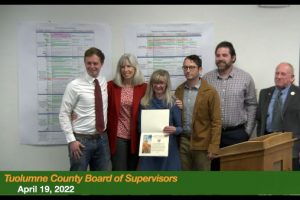 Lynn McCormick in center of photo with Tuolumne County Supervisors (Left to Right) Jaron Brandon, Kathleen Haff, Anaiah Kirk, Ryan Campbell and David Goldemberg