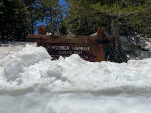 Historical Landmark sign still half way covered with snowHistorical Landmark sign still half way covered with snowHistorical Landmark sign still half way covered with snow