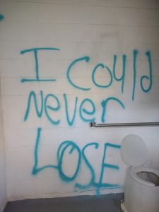 Vandals spray paint graffiti on Riverside Day Use Facility on Stanislaus National Forest