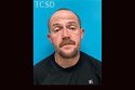 Warrants For Arrest Put Man And Woman In Handcuffs